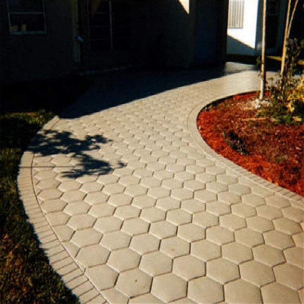 A concrete paver cast at home from a reusable mold